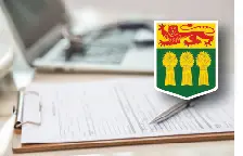 clip board and laptop sitting on top of a desk with a emblem in corner