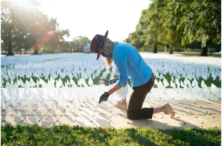 Woman laying flags