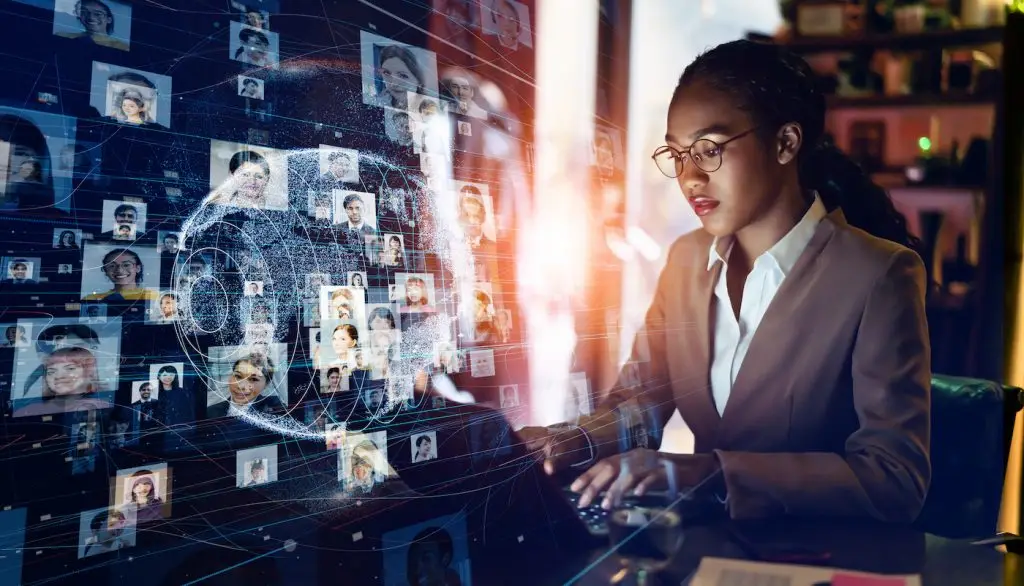 Woman looking up profiles on a computer